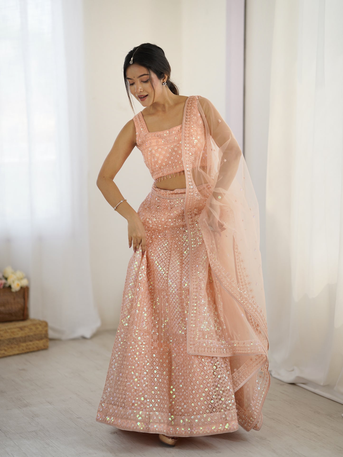 Peach Sparkling Dori Net Lehenga