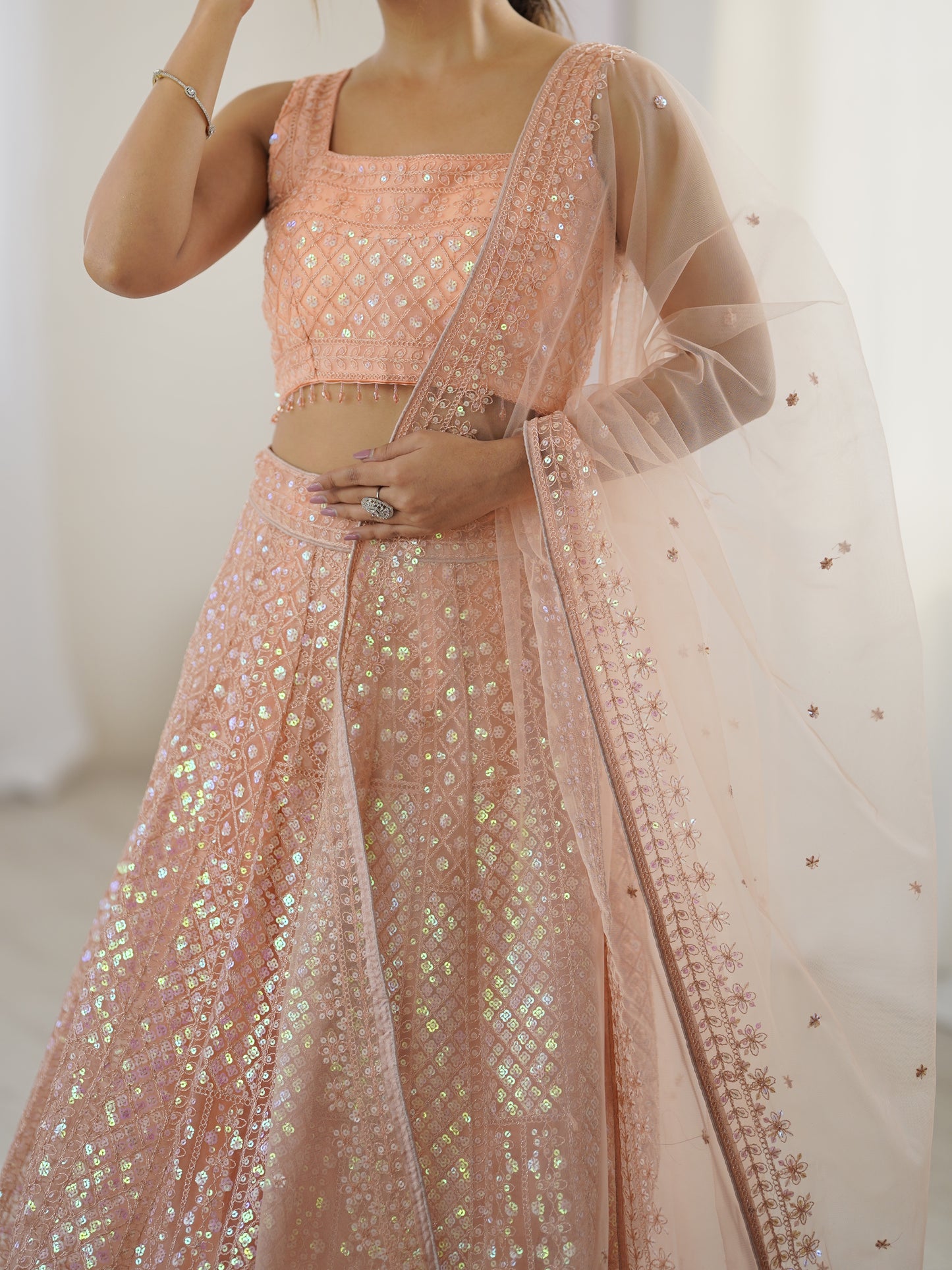 Peach Sparkling Dori Net Lehenga