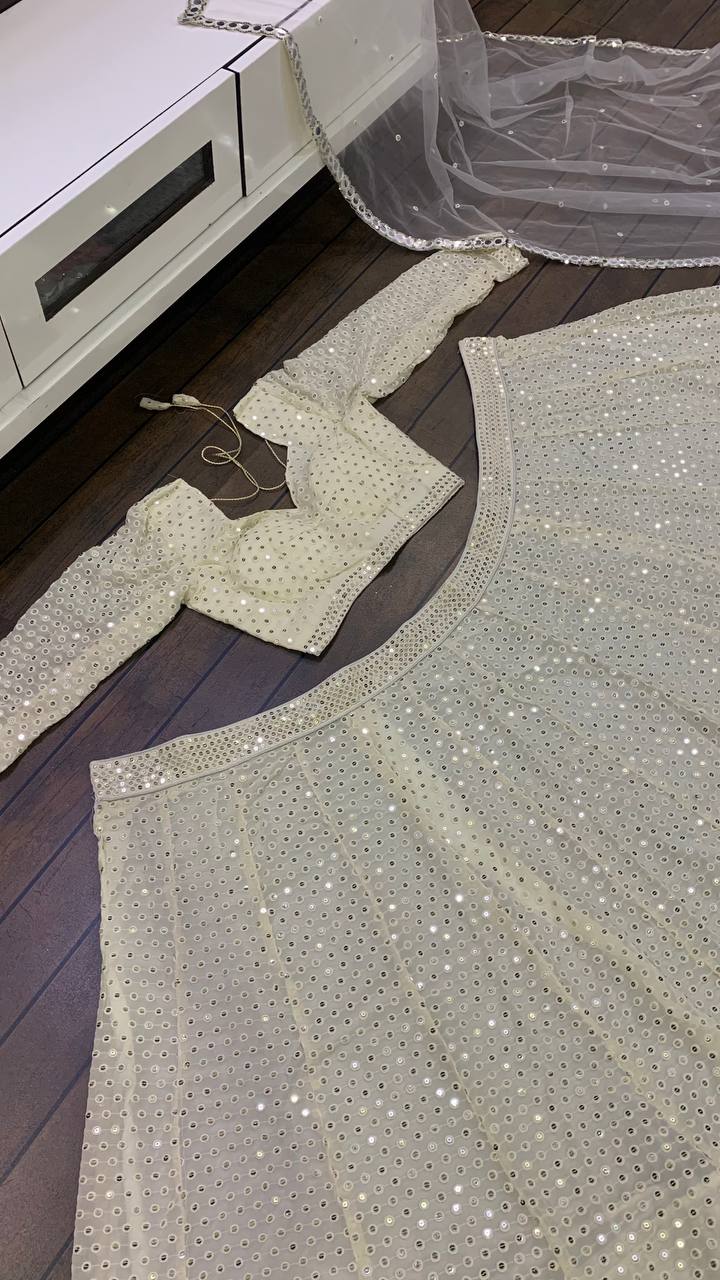 Ivory Lehenga With Intricate Sequin - Accents