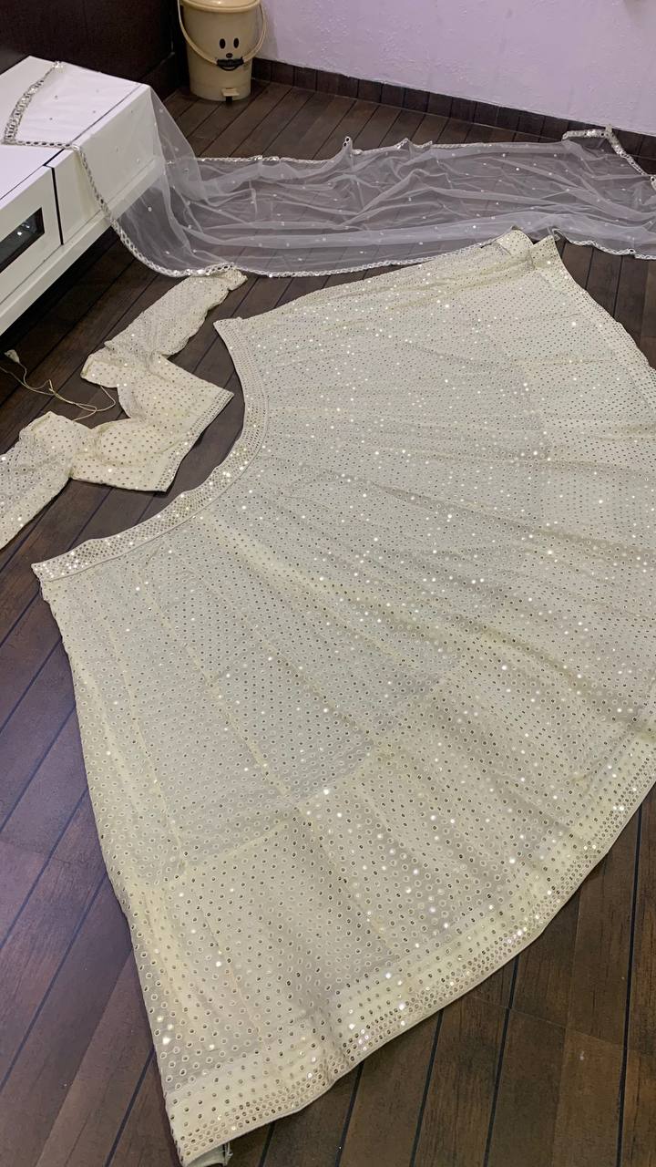 Ivory Lehenga With Intricate Sequin - Accents