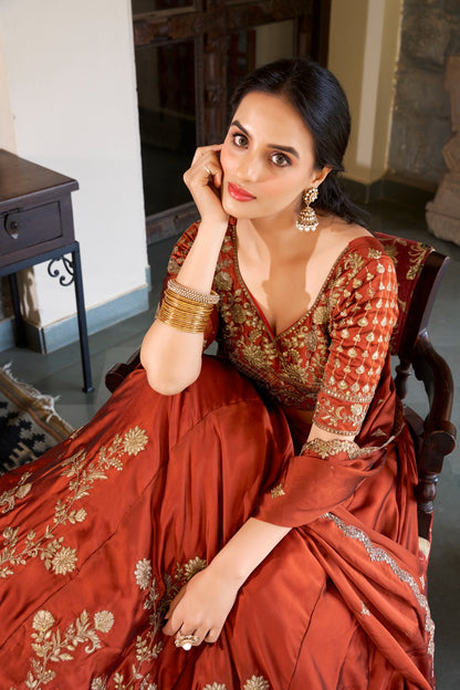 Rust Radiance Lehenga with Golden Touch